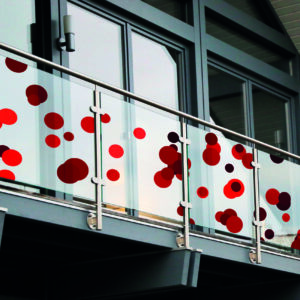 glass balustrade with red dots