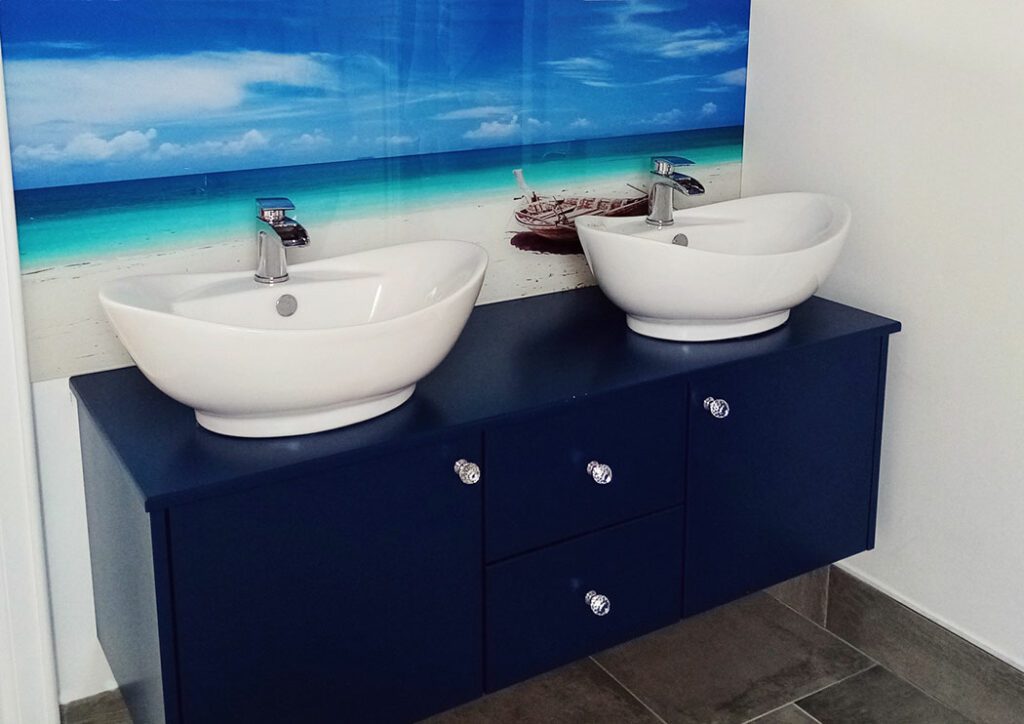 Printed Beach Image on Glass behind Sinks