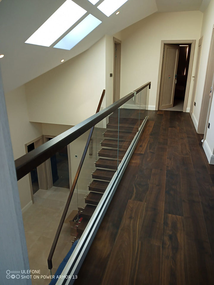 Clear Toughened Glass Balustrade along stairs and landing