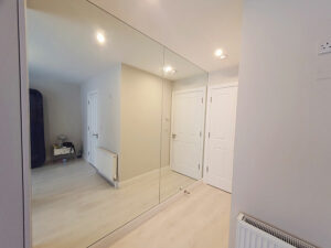 Large Silver Mirrors in hallway