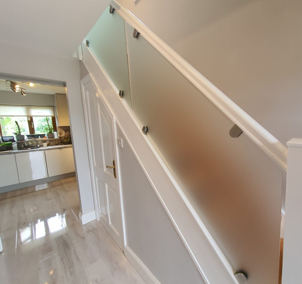 Inside Frosted Glass Balustrade with clamps